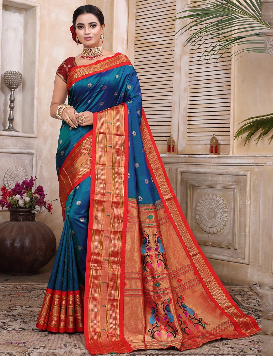 Blue coloured with red skirt border Paithani Saree
